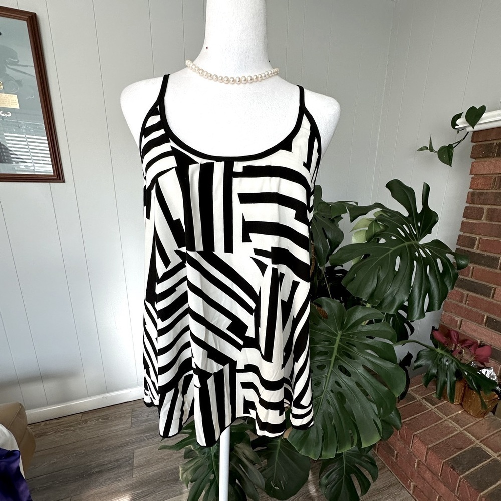 #8)  Amber Blue strap shoulder top size medium excellent condition.